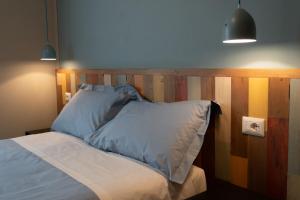 Postel nebo postele na pokoji v ubytování B&B L'Eroico
