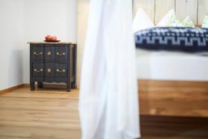 Letto o letti in una camera di Boutique Appartments AlteGreißlerei