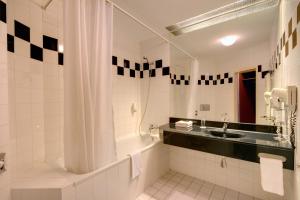 Kúpeľňa v ubytovaní Theatrino Hotel