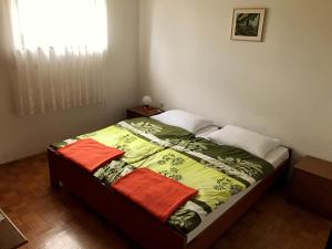 Postel nebo postele na pokoji v ubytování Apartments Markelj