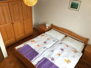 Postel nebo postele na pokoji v ubytování Apartments Markelj