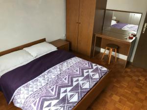 Postel nebo postele na pokoji v ubytování Apartments Markelj