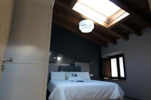 A bed or beds in a room at Gaubeako Ekhia