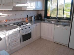 Kuchnia lub aneks kuchenny w obiekcie Apartment Campoamor Descansa