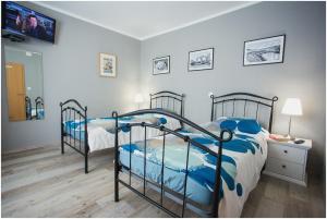 Postel nebo postele na pokoji v ubytování House Mellifera + 37 fotografií
