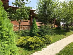 a garden in front of a house at Villa Rubčić in Rakovica