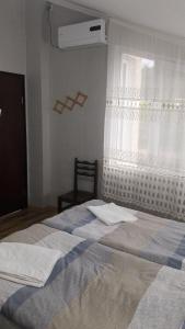 Voodi või voodid majutusasutuse Martvili Newhotel toas