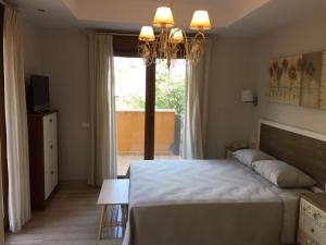 Posteľ alebo postele v izbe v ubytovaní Villa Las Lomas de Marbella