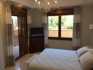 Posteľ alebo postele v izbe v ubytovaní Villa Las Lomas de Marbella