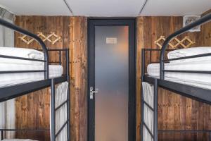 Postel nebo postele na pokoji v ubytování Rom Casa Hostel Da Nang