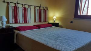Postel nebo postele na pokoji v ubytování Corallo casa vacanza
