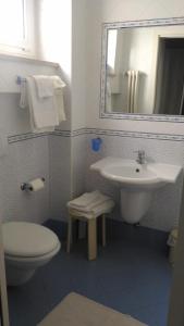 Koupelna v ubytování Hotel Monti