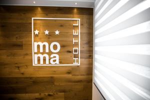 Majutusasutuses Moma Hotel Wellness & Spa olev sertifikaat, autasu, silt või muu dokument