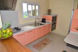 Nhà bếp/bếp nhỏ tại Résidence Kay Mamy Zèt