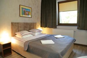 Posteľ alebo postele v izbe v ubytovaní B & B Tomula