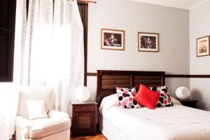 Cama ou camas em um quarto em Hostal Boonen