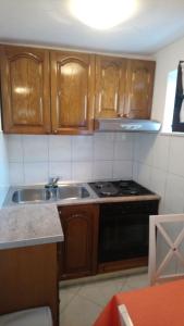 Kuchyň nebo kuchyňský kout v ubytování Apartment Marija