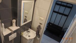 Een badkamer bij Apartament Kotewka 3