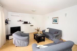 Ein Sitzbereich in der Unterkunft Apartment Jusepe