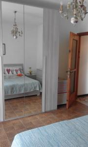 Кровать или кровати в номере Casa Andreoli
