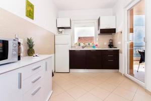 Küche/Küchenzeile in der Unterkunft Apartment Jusepe
