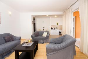 Ein Sitzbereich in der Unterkunft Apartment Jusepe
