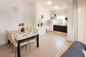 Ein Sitzbereich in der Unterkunft Apartment Jusepe