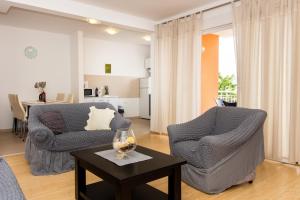 Ein Sitzbereich in der Unterkunft Apartment Jusepe