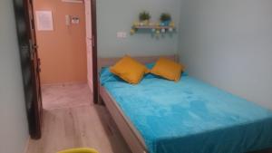 Łóżko lub łóżka w pokoju w obiekcie Apartment Joanna Grau de Gandia