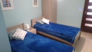 Łóżko lub łóżka w pokoju w obiekcie Apartment Joanna Grau de Gandia