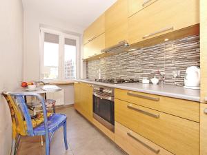 Kuchyňa alebo kuchynka v ubytovaní Apartament Kameralny nad Motławą