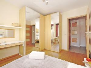 Posteľ alebo postele v izbe v ubytovaní Apartament Kameralny nad Motławą