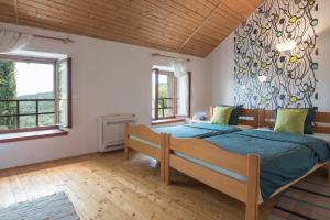 Voodi või voodid majutusasutuse Holiday Home Vizinada toas