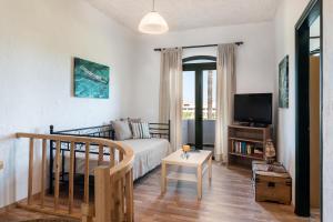 Zona d'estar a Traditional Sea Side Cottage