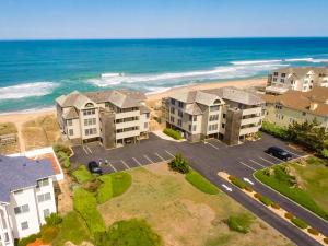 an aerial view of an apartment complex near the beach at Ocean Song - 2 Bedroom Oceanfront Penthouse Condo in Kill Devil Hills, Spacious Layout in Kill Devil Hills