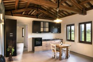 Kuchyň nebo kuchyňský kout v ubytování Hotel Villaggio Le Stelline