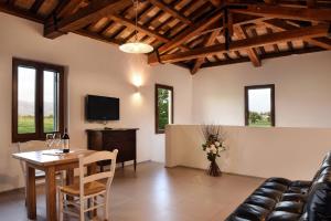 TV a/nebo společenská místnost v ubytování Hotel Villaggio Le Stelline