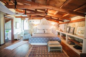 Ένα ή περισσότερα κρεβάτια σε δωμάτιο στο Villa Armonia