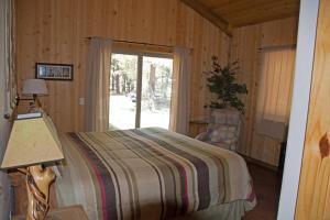 Postel nebo postele na pokoji v ubytování DiamondStone Guest Lodges