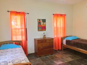 Postelja oz. postelje v sobi nastanitve Mariposa Gran Pacifica Resort