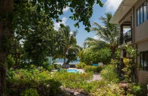 Jardin de l'établissement Le Repaire - Boutique Hotel & Restaurant