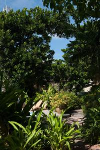 Jardin de l'établissement Le Repaire - Boutique Hotel & Restaurant