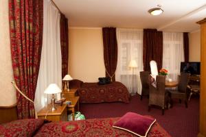 Кровать или кровати в номере Boutique Hotel Monte Kristo