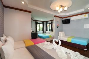 Posezení v ubytování Sinsamut Koh Samed