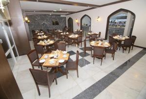 En restaurant eller et andet spisested på Sama Hotel Jabal Al Akhdar