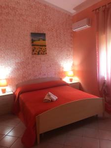 Postel nebo postele na pokoji v ubytování Cilento