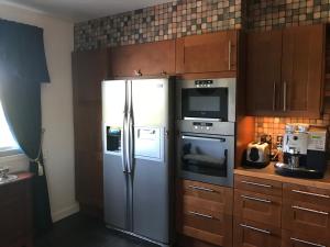 Dapur atau dapur kecil di BoSmart Apartments