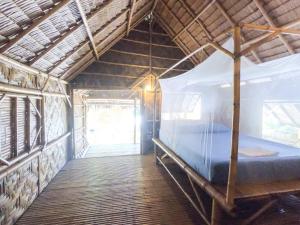 Postel nebo postele na pokoji v ubytování Forra Dive Resort Pattaya Beach