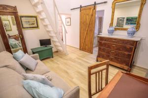 Posezení v ubytování "Il principio di Archimede"guest & art house