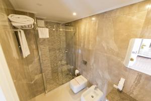 Koupelna v ubytování Eler Hotel